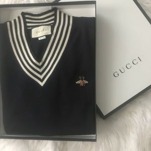 sweater with bee logo